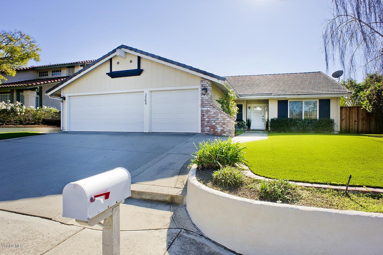 3560 Radcliffe Road Thousand Oaks, CA 91360 - Photo 1 of 26 a front view of a house with a yard garage and outdoor seating