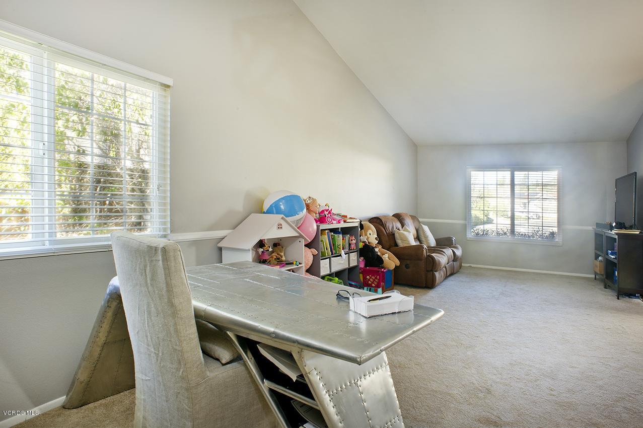 3560 Radcliffe Road Thousand Oaks, CA 91360 - Photo 6 of 26 a view of a workspace with furniture and a window