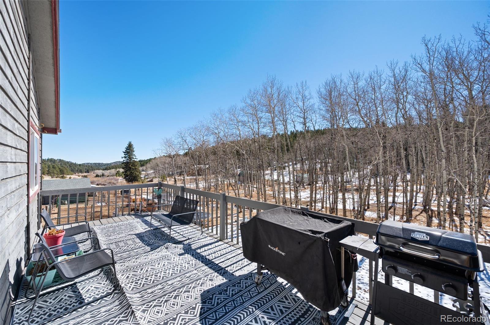 2222 County Road 72 Bailey, CO 80421 - Photo 14 of 50 a view of a terrace with seating area