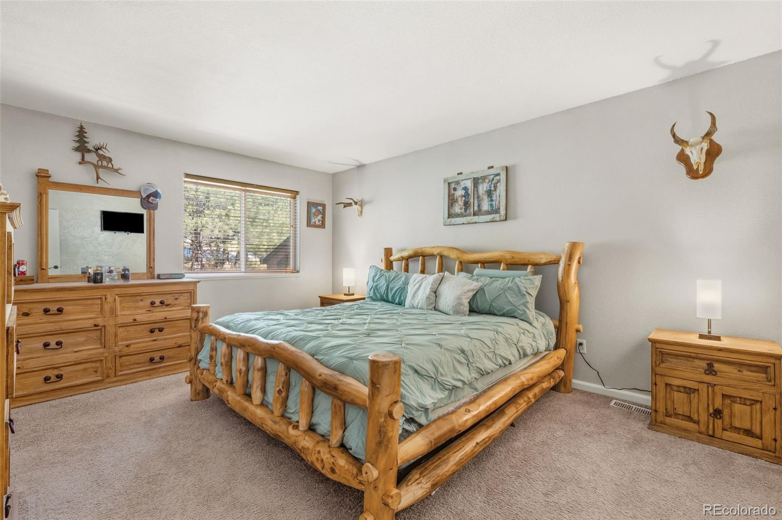2222 County Road 72 Bailey, CO 80421 - Photo 20 of 50 a bedroom with a bed and a window