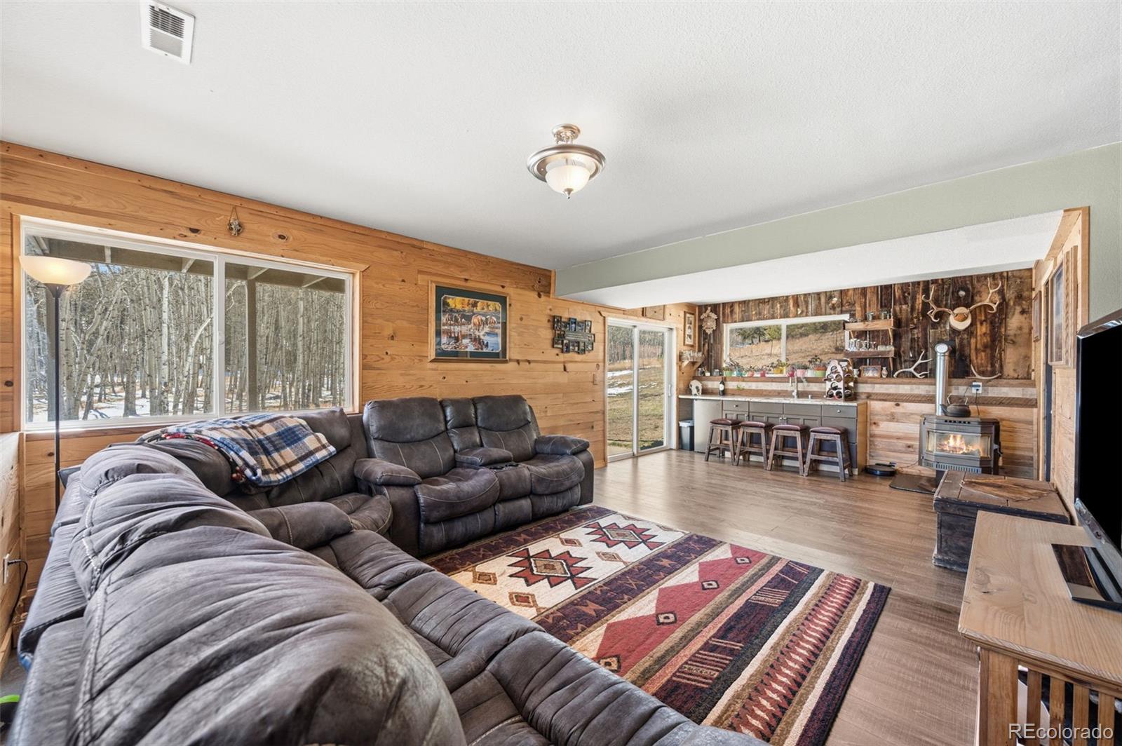 2222 County Road 72 Bailey, CO 80421 - Photo 28 of 50 a living room with furniture and a table