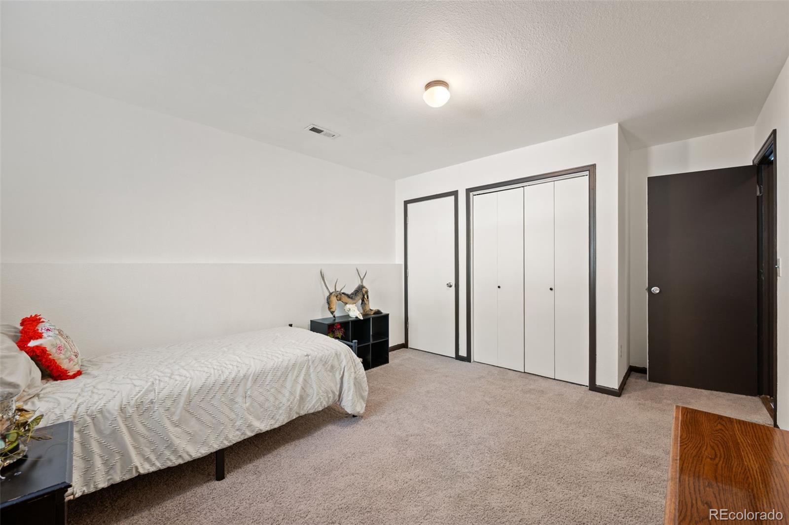2222 County Road 72 Bailey, CO 80421 - Photo 35 of 50 a bedroom with a bed and a window