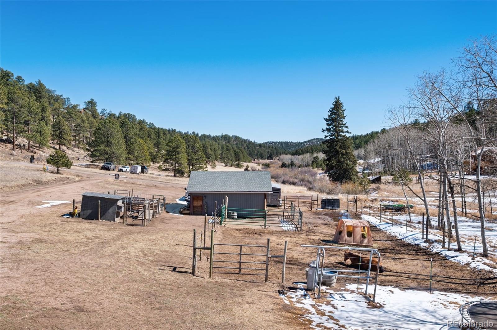 2222 County Road 72 Bailey, CO 80421 - Photo 39 of 50 a view of a terrace with sitting area
