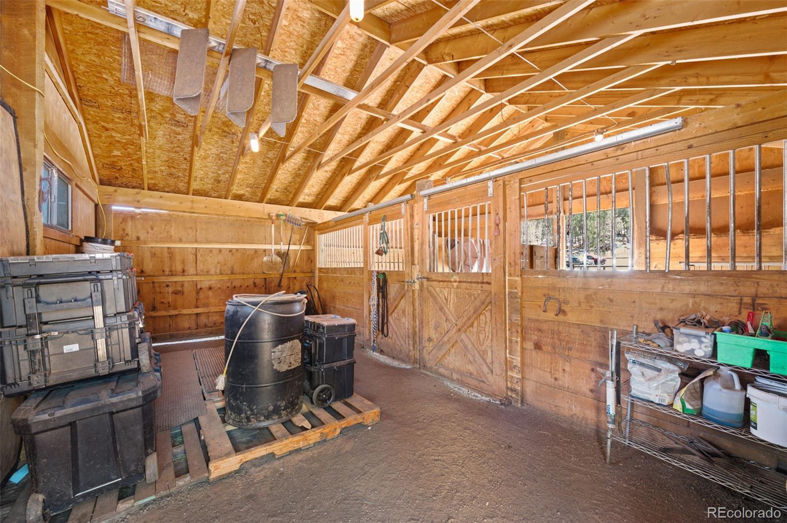 2222 County Road 72 Bailey, CO 80421 - Photo 42 of 50 a view of a patio with table and chairs