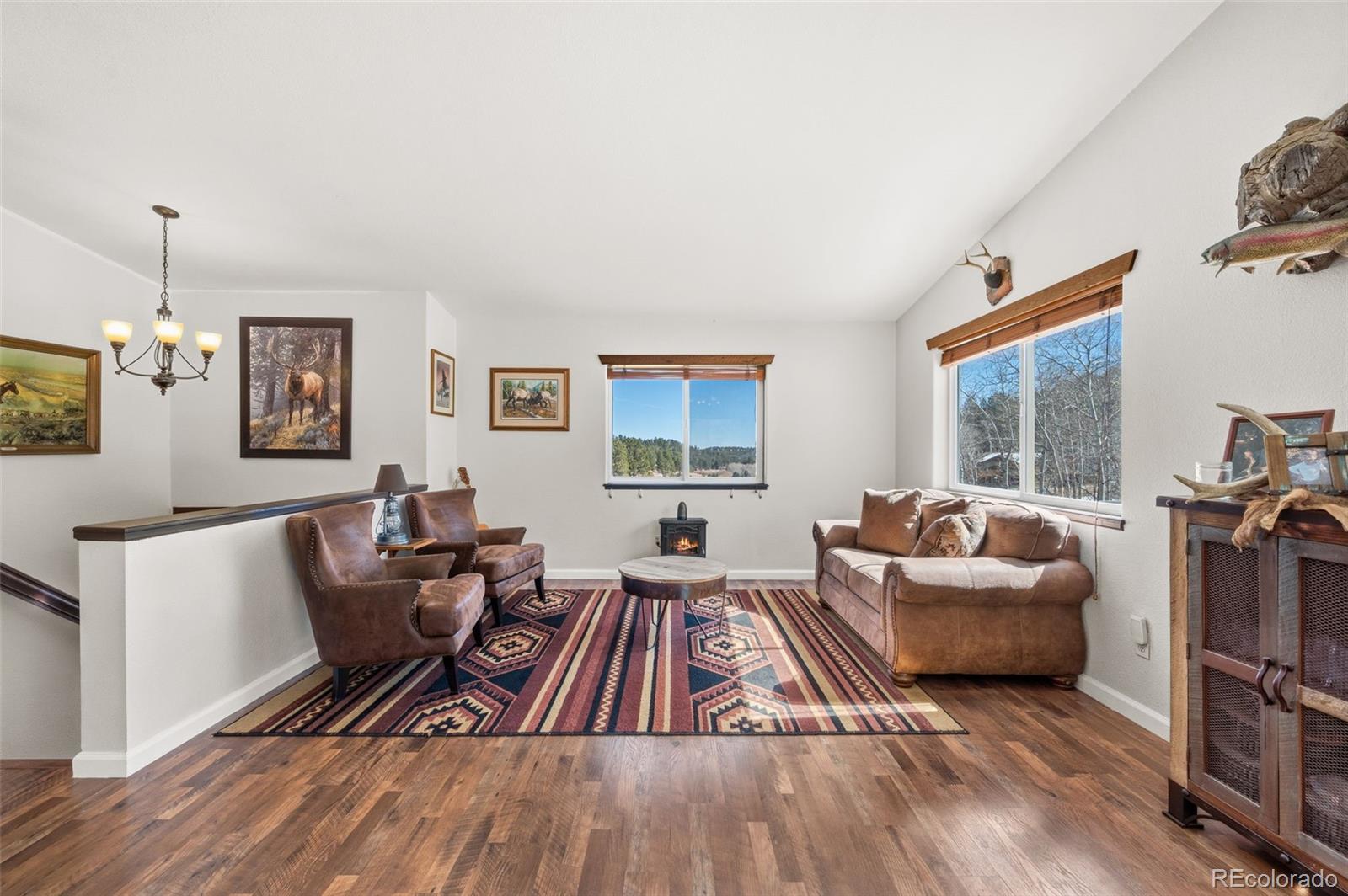 2222 County Road 72 Bailey, CO 80421 - Photo 8 of 50 a living room with furniture and a window