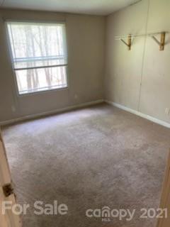 3310 Falcon Ridge Road Maiden, NC 28650 - Photo 11 of 12 a view of an empty room with a window