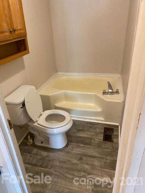 3310 Falcon Ridge Road Maiden, NC 28650 - Photo 10 of 12 a bathroom with a toilet and a bathtub