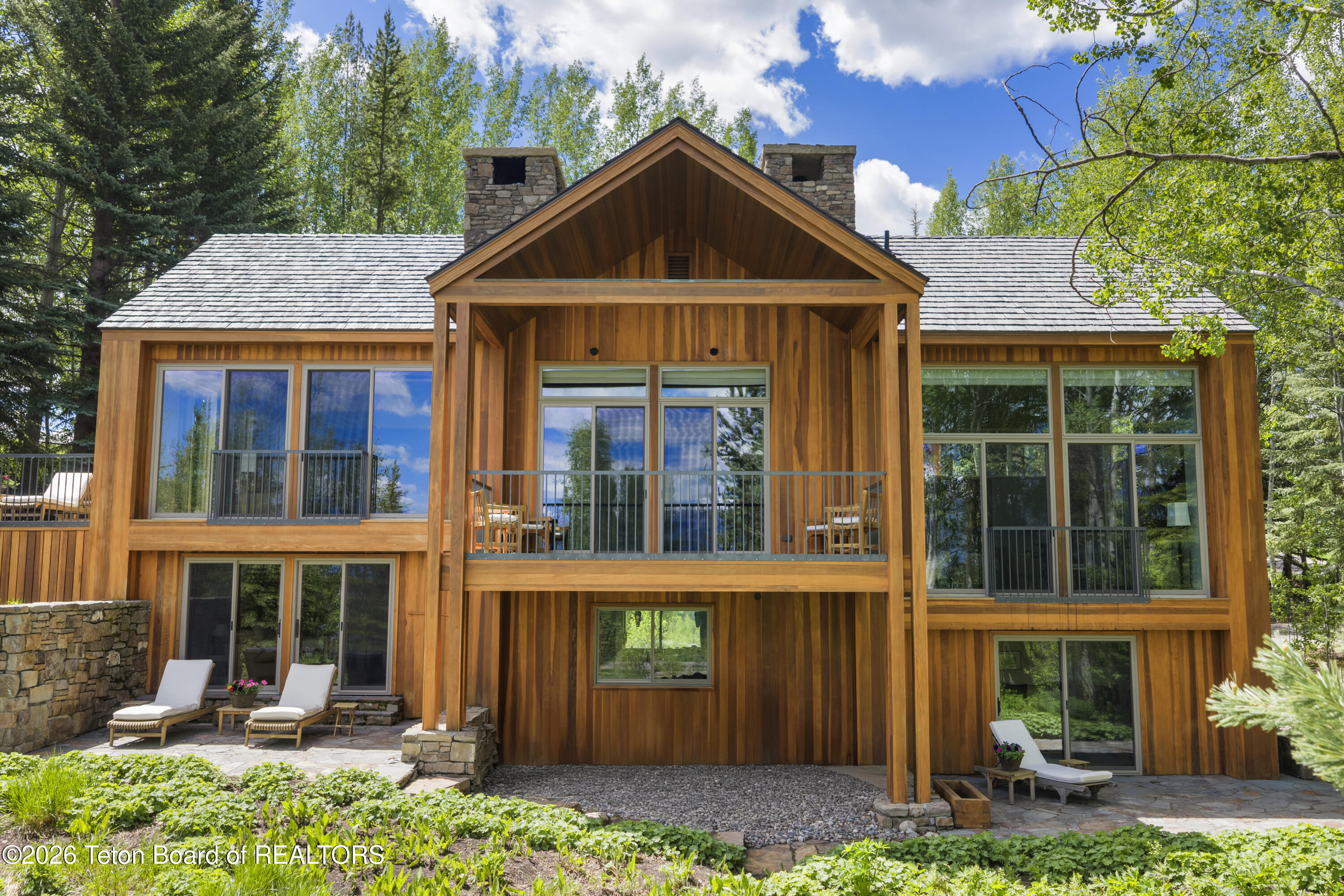 5070 Beavertail Road Wilson, WY 83014 - Photo 1 of 34 Expansive North-Facing Glass