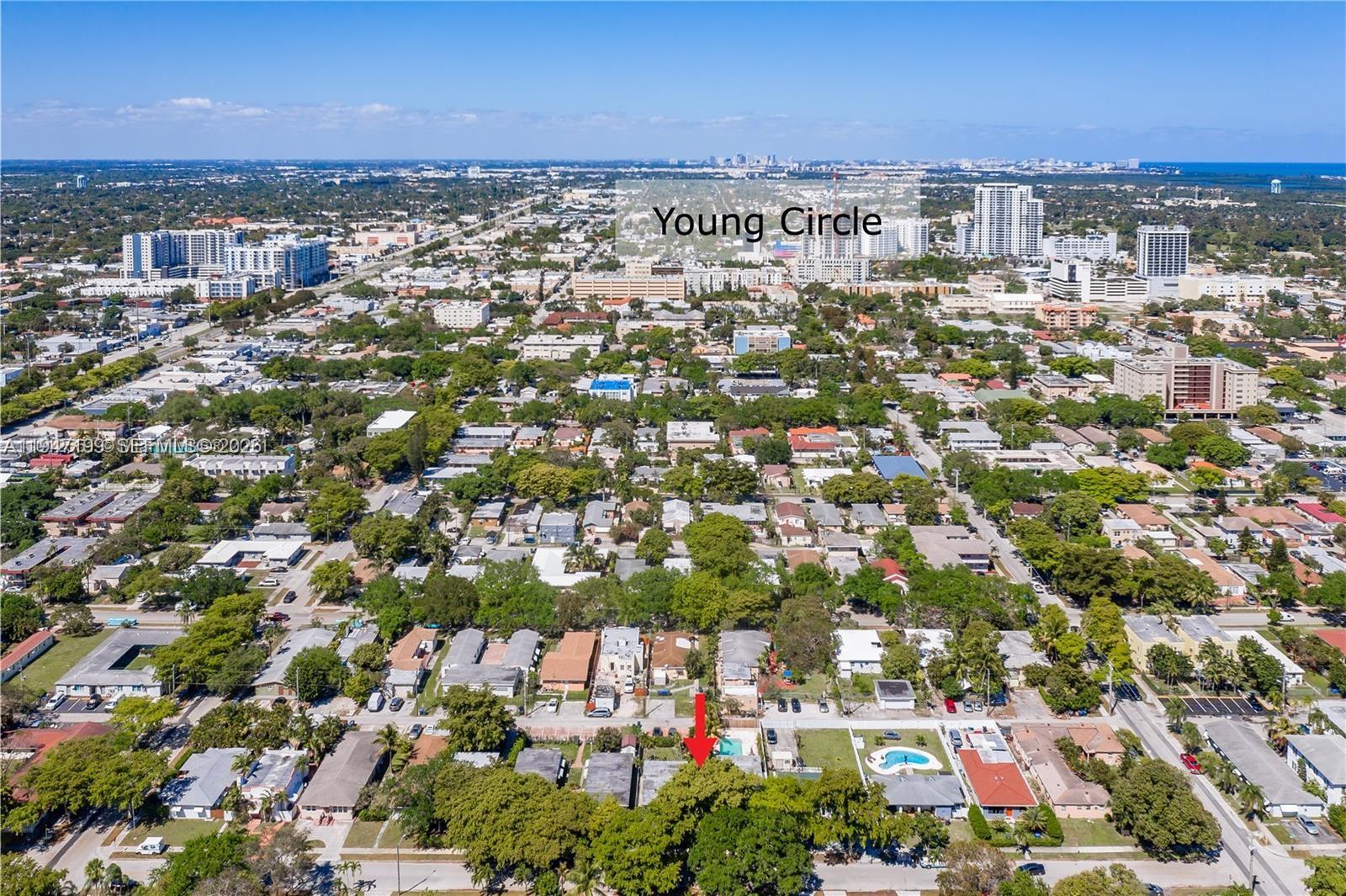 1925 Dewey Street, Unit 3 Hollywood, FL 33020 - Photo 3 of 27 an aerial view of a city with lots of residential buildings