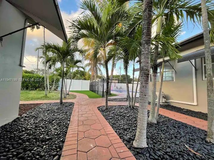 1925 Dewey Street, Unit 3 Hollywood, FL 33020 - Photo 6 of 27 a view of a backyard