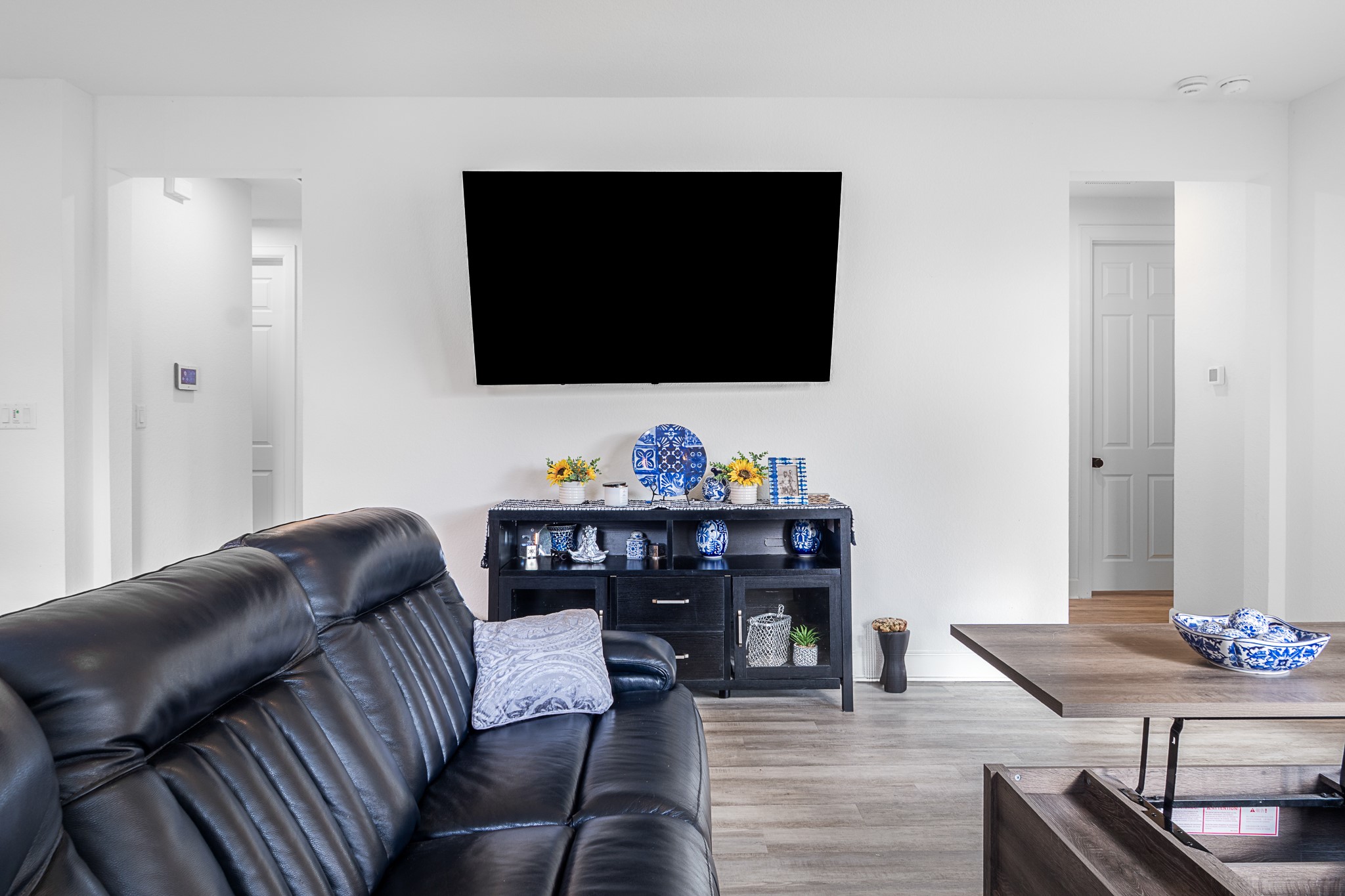 20811 Phebe Foster Street Manor, TX 78653 - Photo 15 of 40 Living room featuring wood finished floors