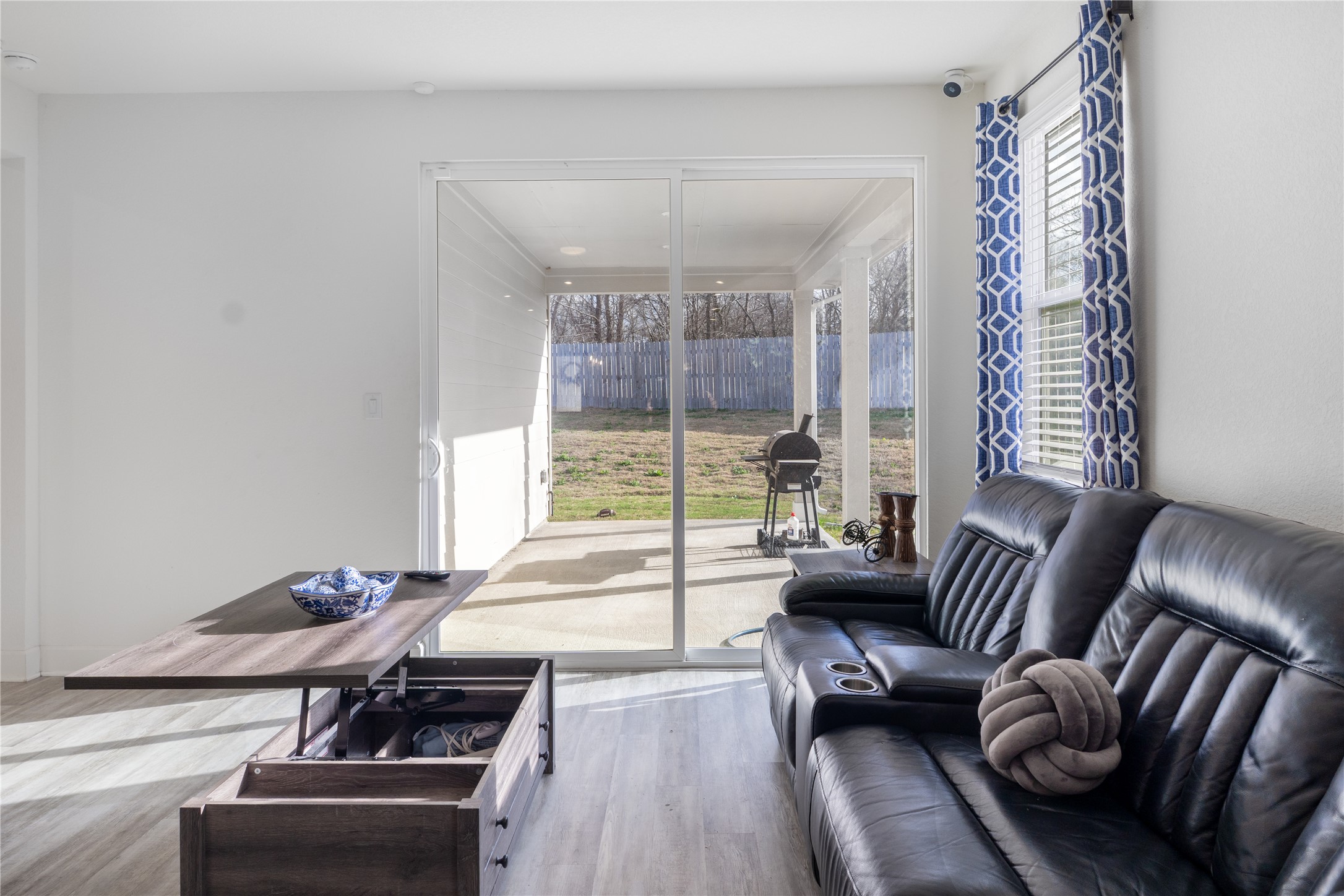 20811 Phebe Foster Street Manor, TX 78653 - Photo 16 of 40 Living area with wood finished floors