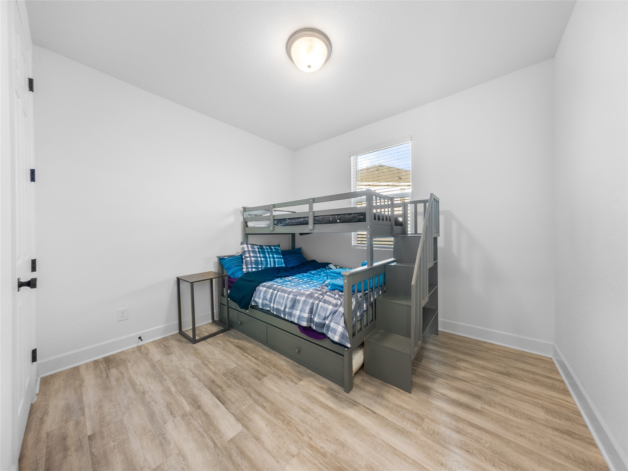 20811 Phebe Foster Street Manor, TX 78653 - Photo 24 of 40 Bedroom with light wood-type flooring