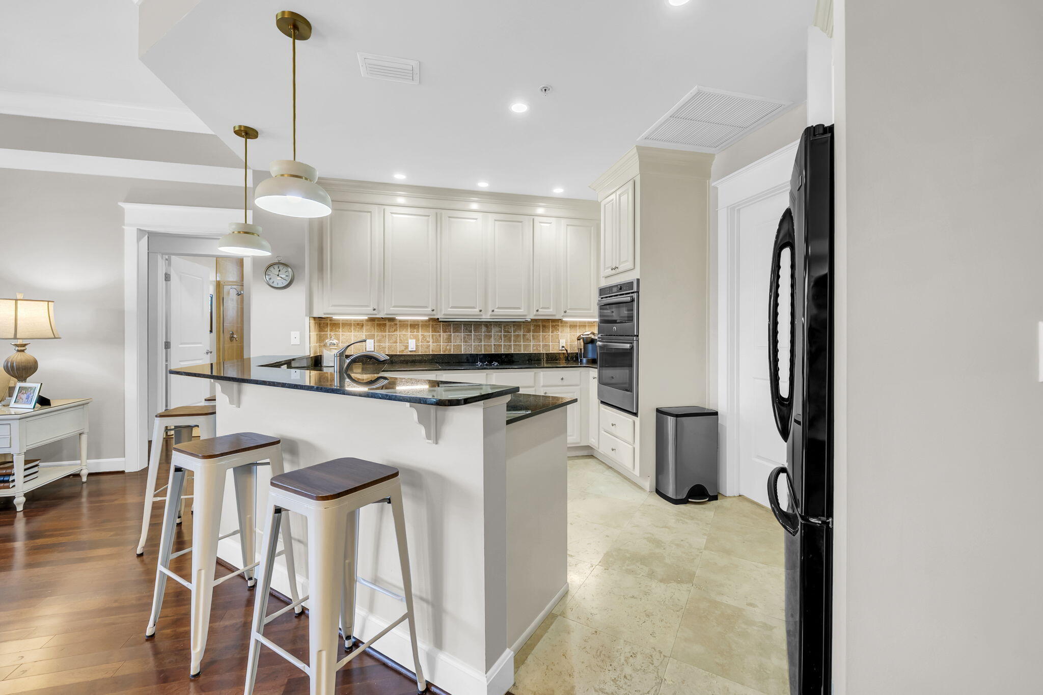 5360 Pine Ridge Lane, Unit 5360 Miramar Beach, FL 32550 - Photo 18 of 44 a kitchen with stainless steel appliances granite countertop a refrigerator and a stove top oven