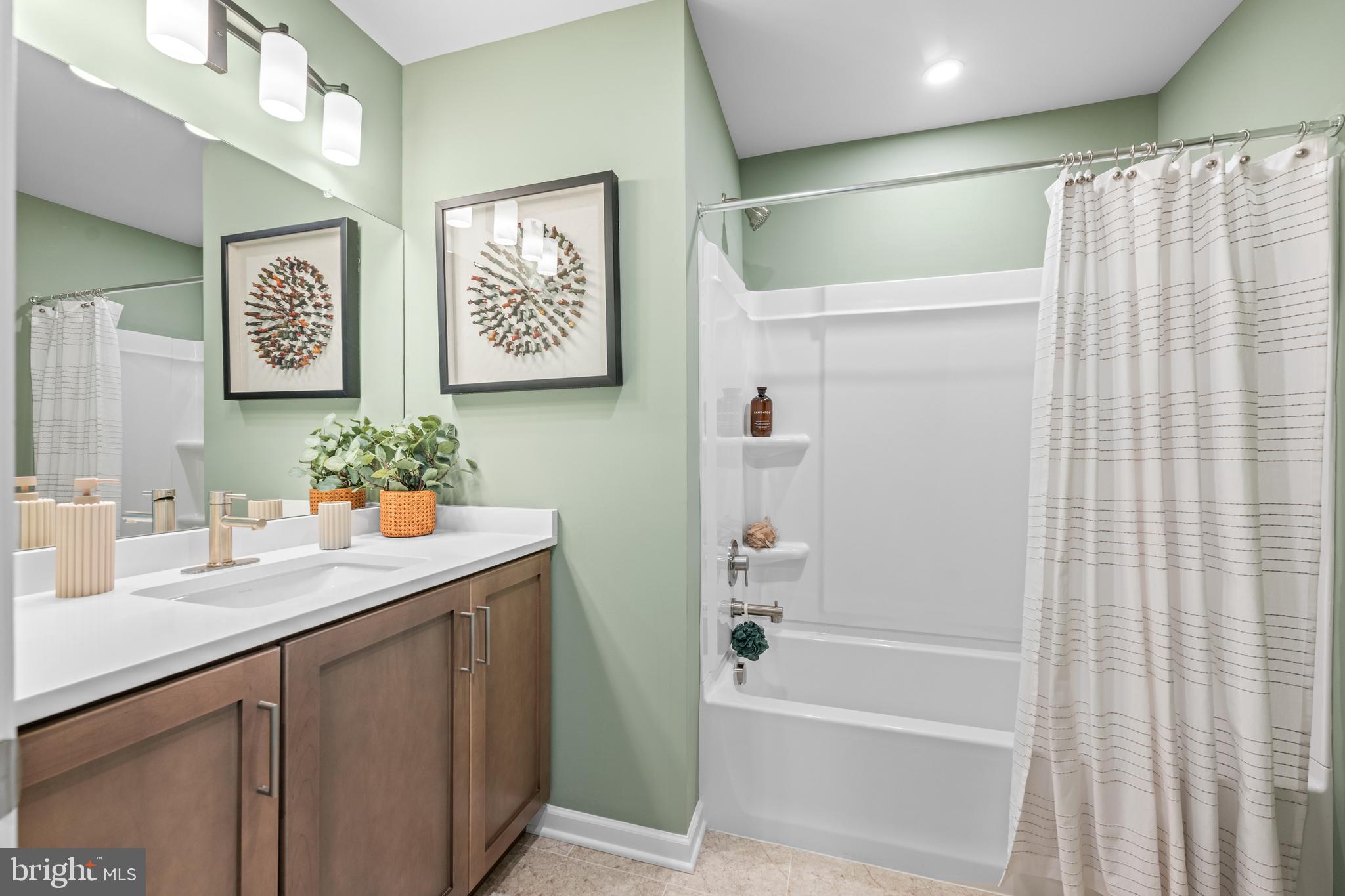 156 Bancroft Road, Unit SGR Kennett Square, PA 19348 - Photo 25 of 46 a bathroom with a sink and a bathtub