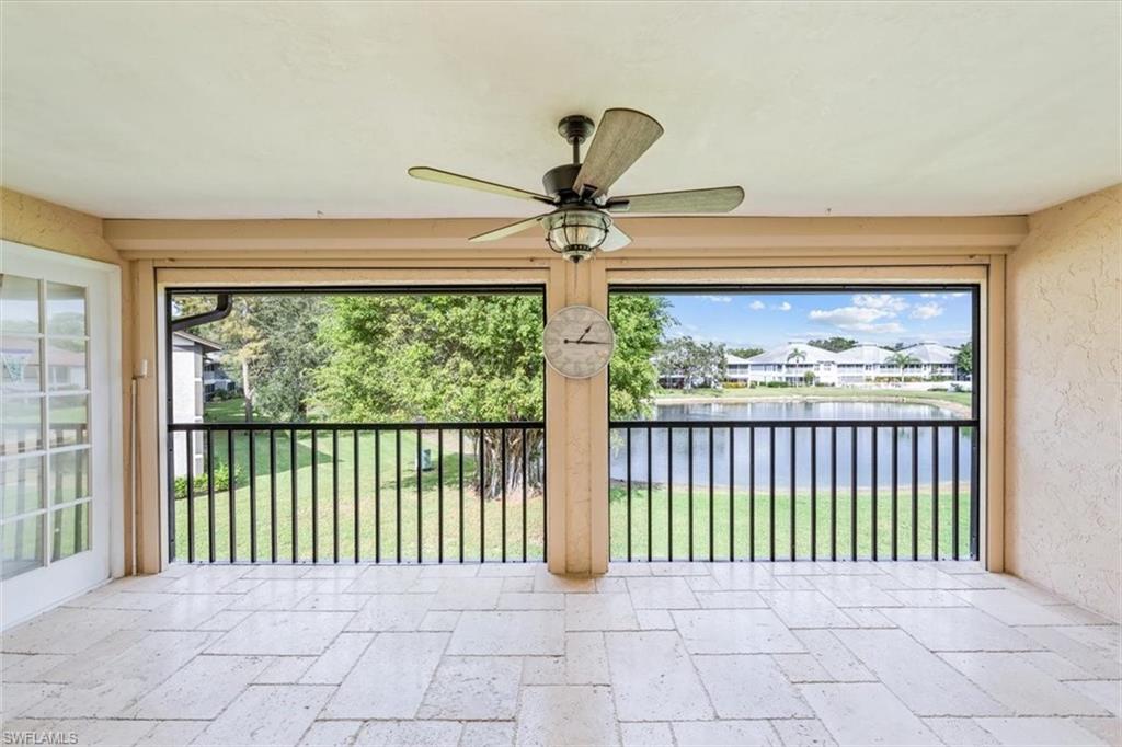 a view of a room with a large window