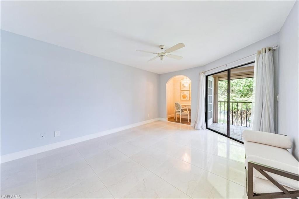 Undisclosed Address Naples, FL 34105 - Photo 17 of 24 a view of an empty room with a window