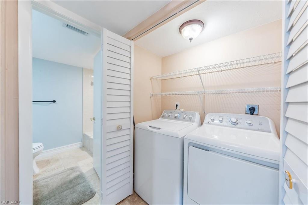 Undisclosed Address Naples, FL 34105 - Photo 22 of 24 a view of bathroom and utility room