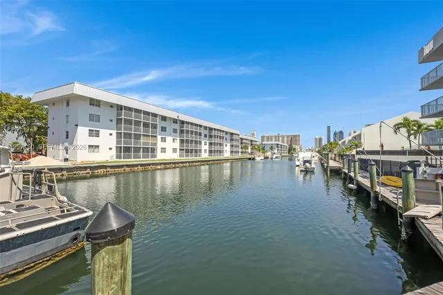 a view of a lake with a building in front of it