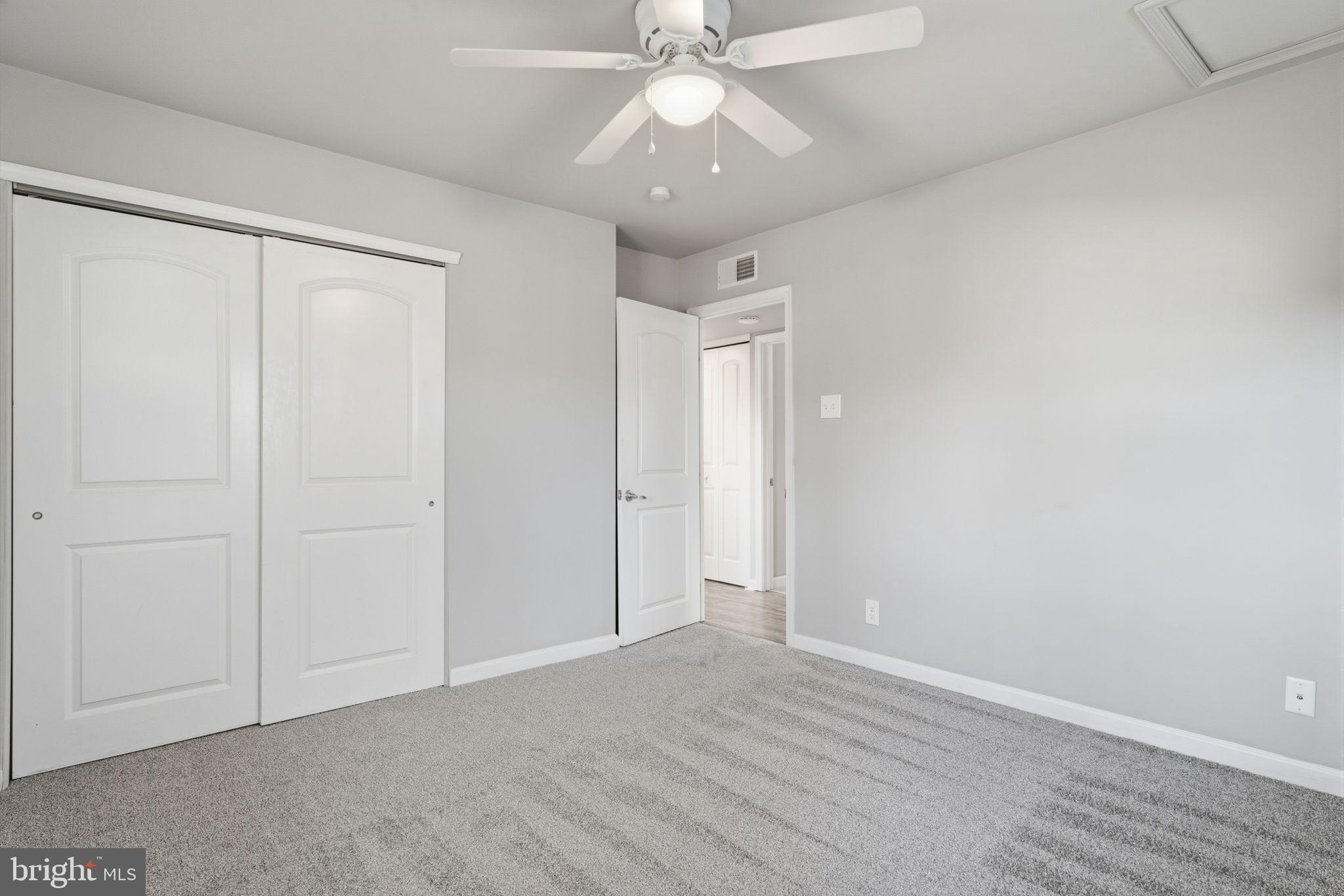 208 Trenton Road Fairless Hills, PA 19030 - Photo 26 of 35 a view of an empty room and chandelier fan