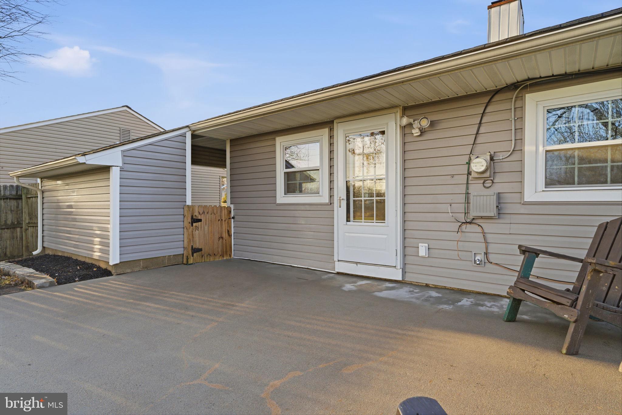 208 Trenton Road Fairless Hills, PA 19030 - Photo 32 of 35 a view of backyard with a chair and roof