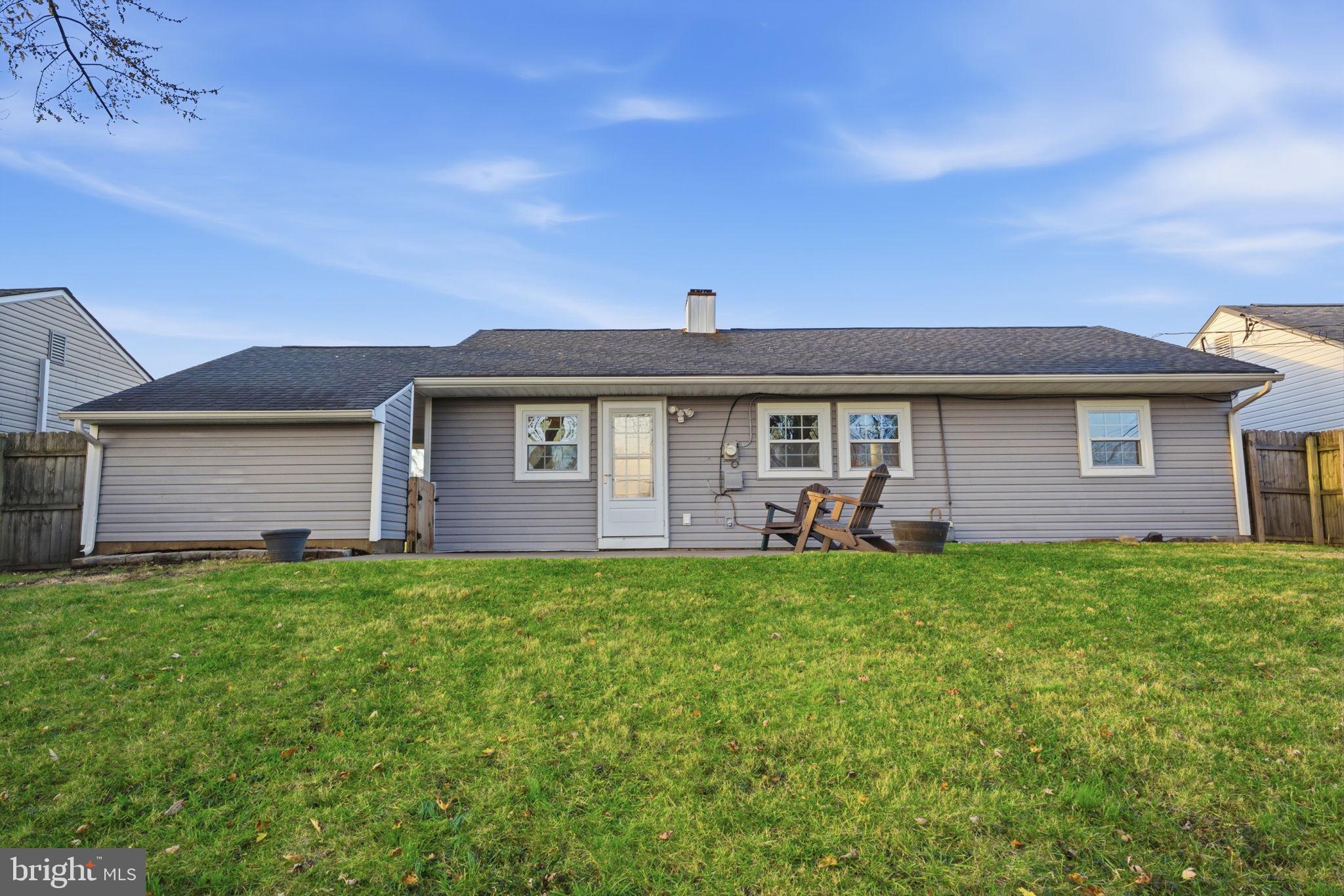 208 Trenton Road Fairless Hills, PA 19030 - Photo 34 of 35 a front view of a house with a garden