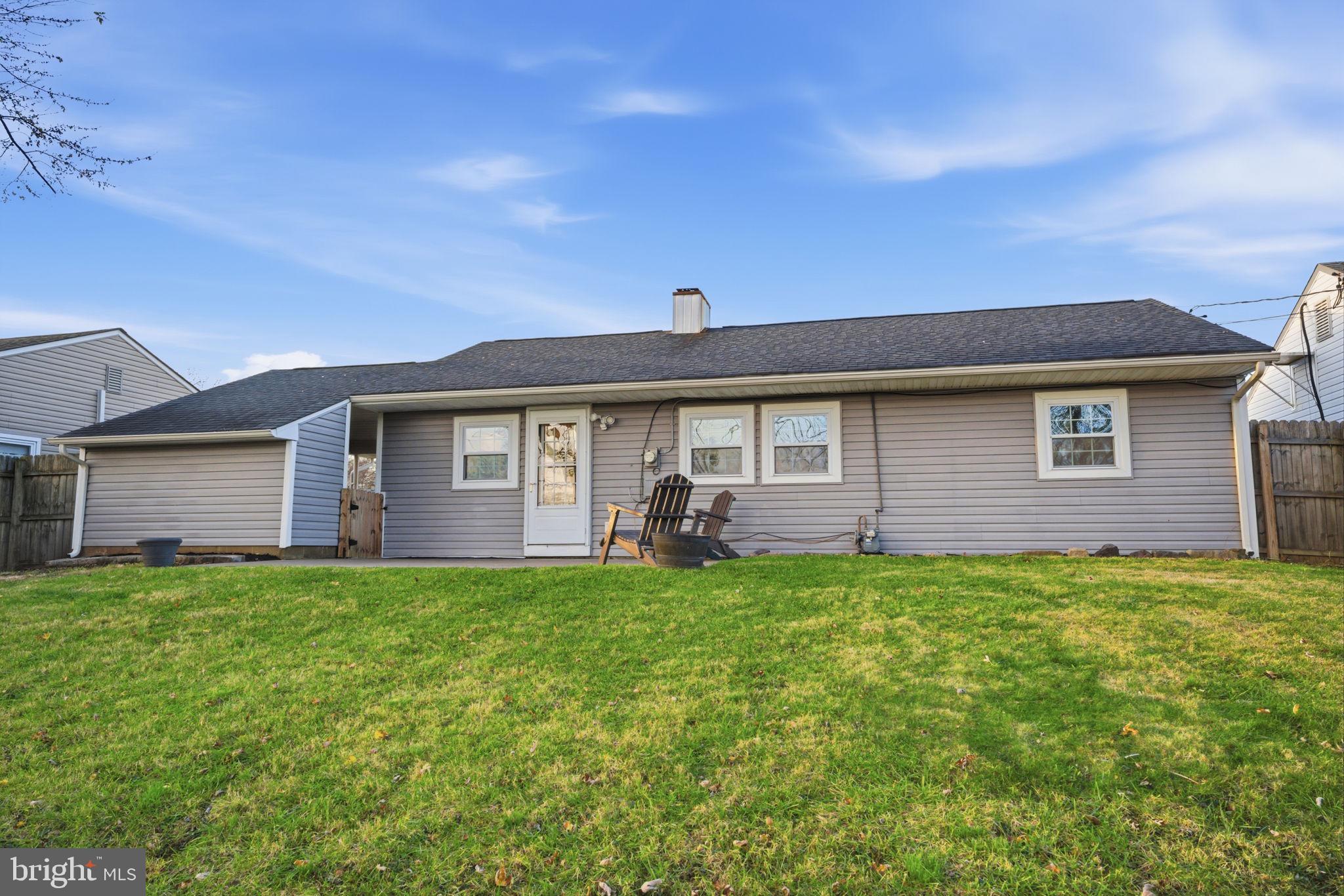 208 Trenton Road Fairless Hills, PA 19030 - Photo 35 of 35 a front view of a house with a yard