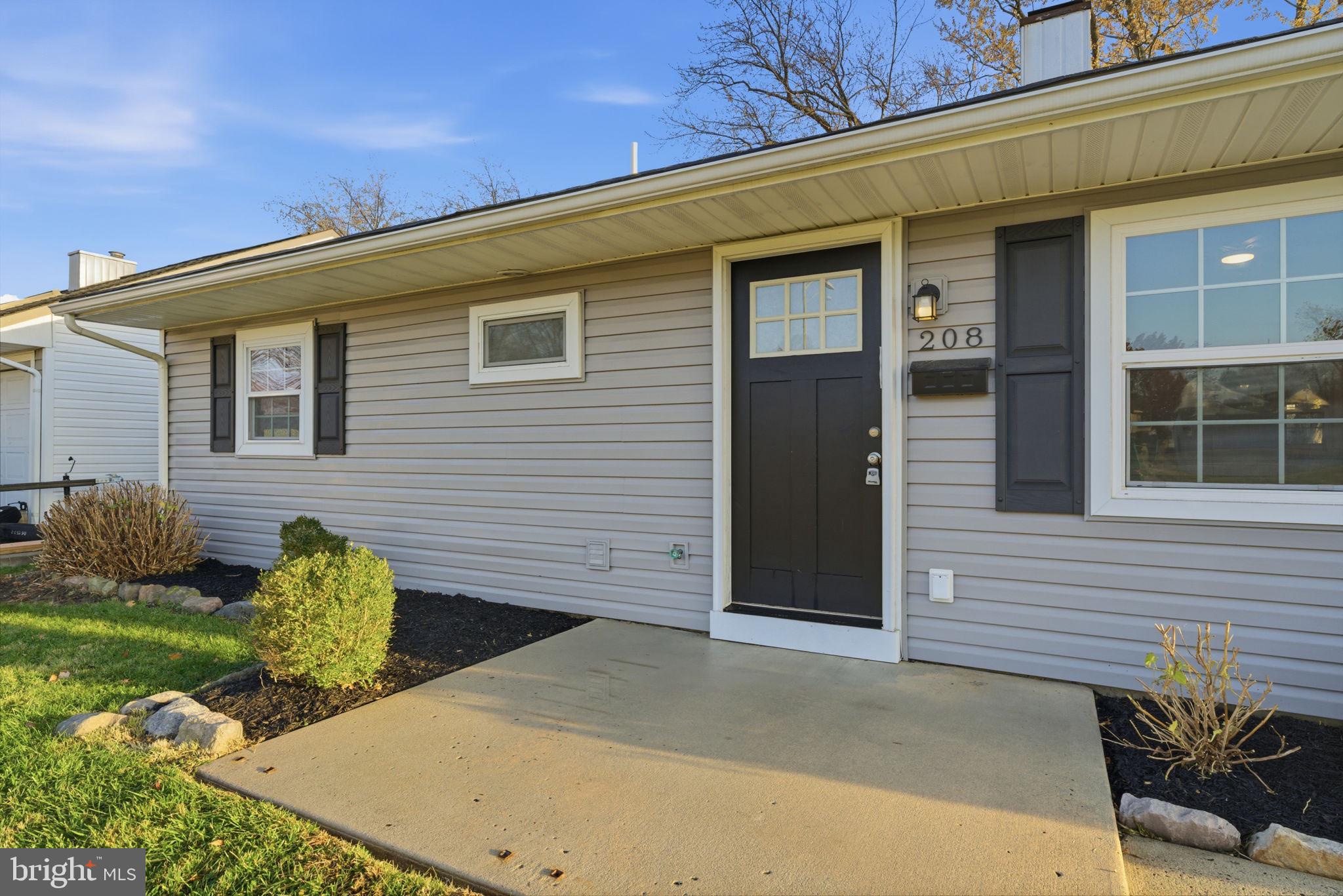 208 Trenton Road Fairless Hills, PA 19030 - Photo 4 of 35 a view of backyard with outdoor seating