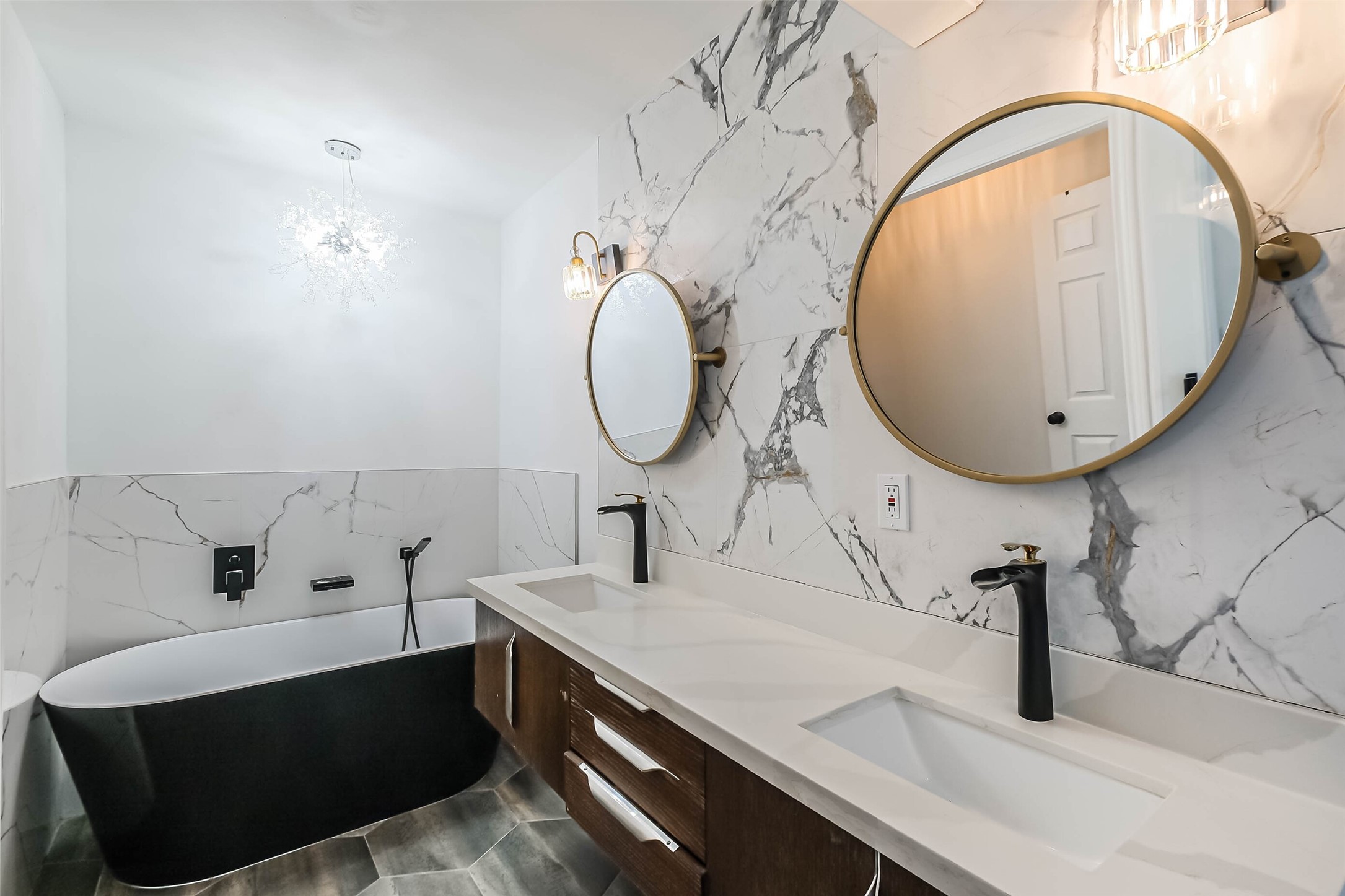 11019 Clodine Road Sugar Land, TX 77498 - Photo 20 of 39 a bathroom with a sink and a mirror
