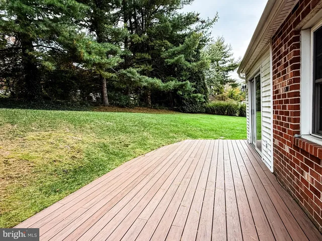 a view of backyard with green space