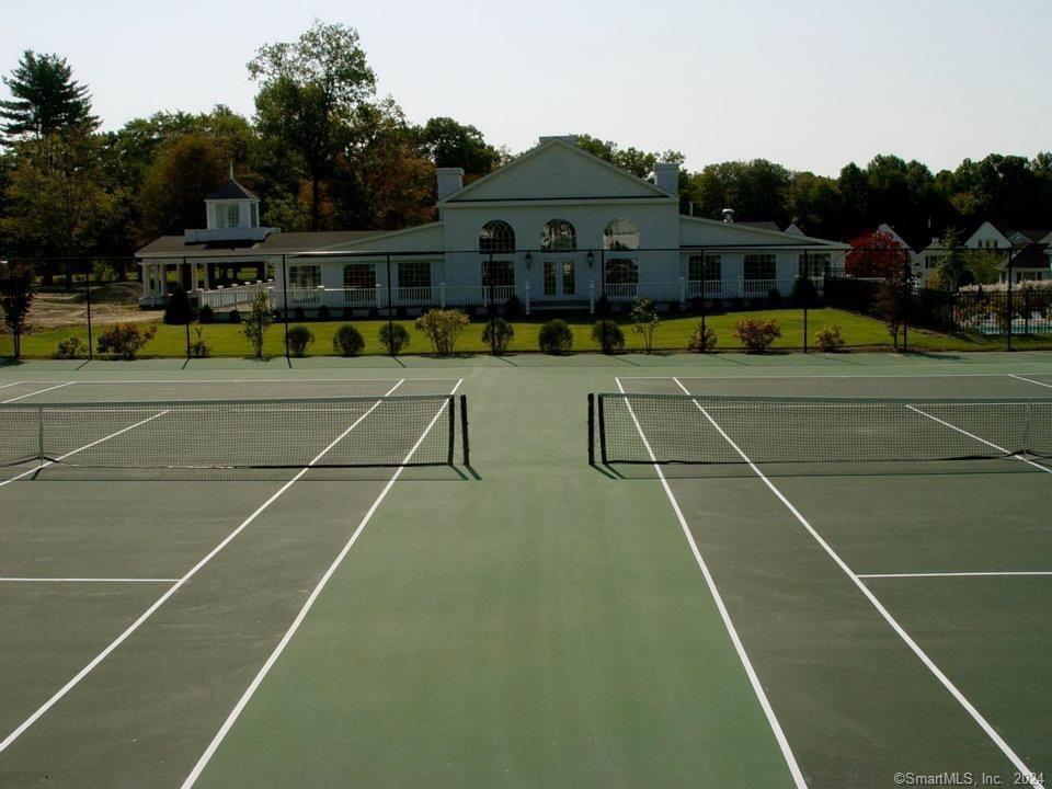 3 Banner Road, Unit 118 East Haddam, CT 06469 - Photo 5 of 17 a view of a tennis ground with large trees