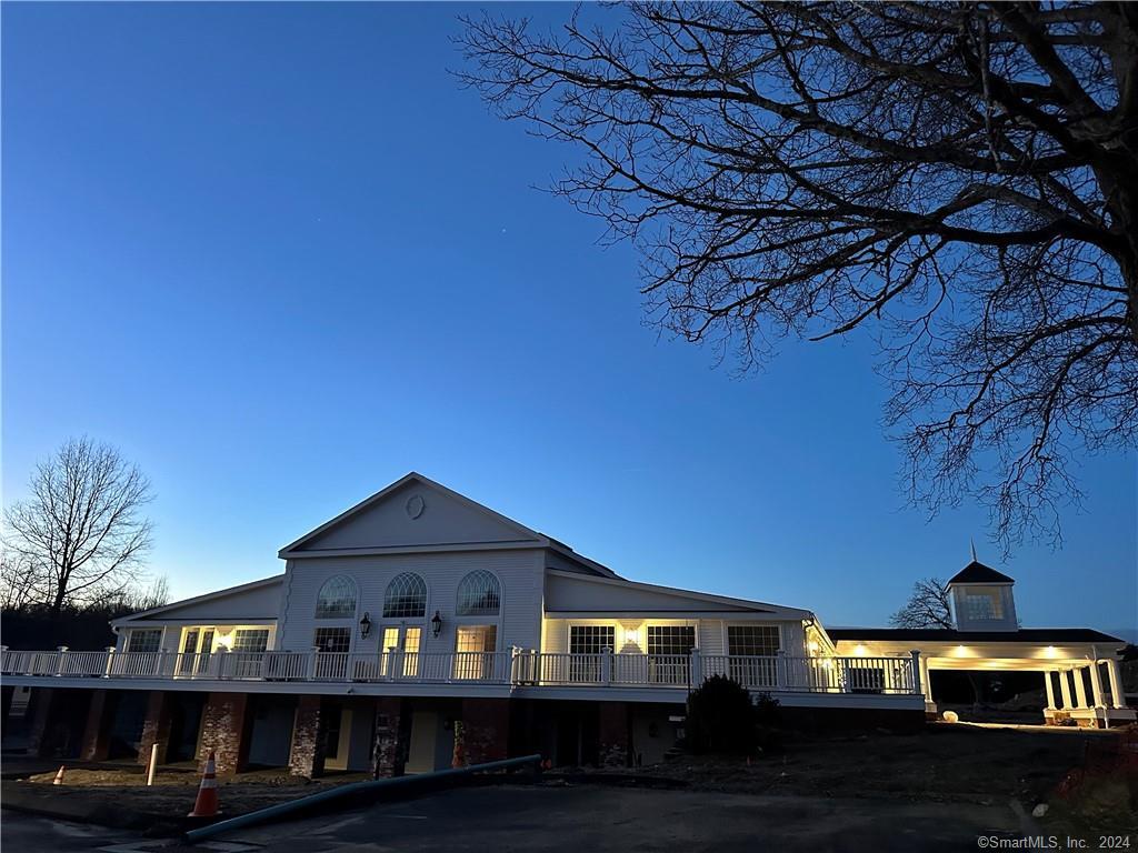 3 Banner Road, Unit 118 East Haddam, CT 06469 - Photo 7 of 17 a front view of a house with a yard