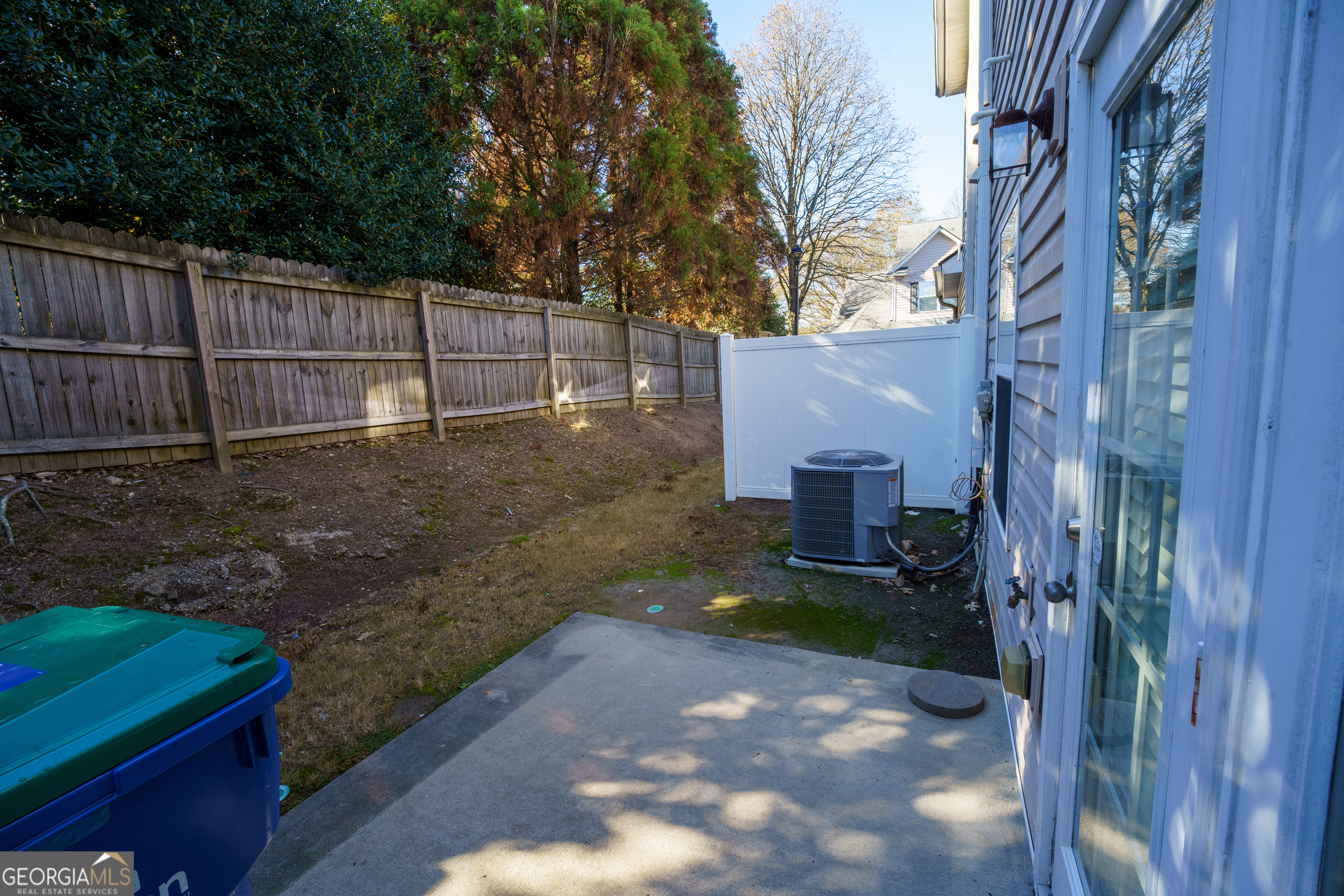 2555 Flat Shoals Road, Unit 1402 South Fulton, GA 30349 - Photo 14 of 18 a view of a brick wall in front of a building