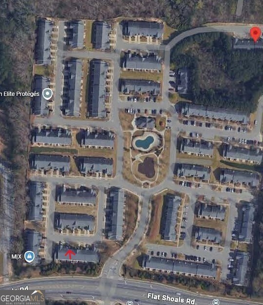 2555 Flat Shoals Road, Unit 1402 South Fulton, GA 30349 - Photo 18 of 18 a building with multiple glass windows