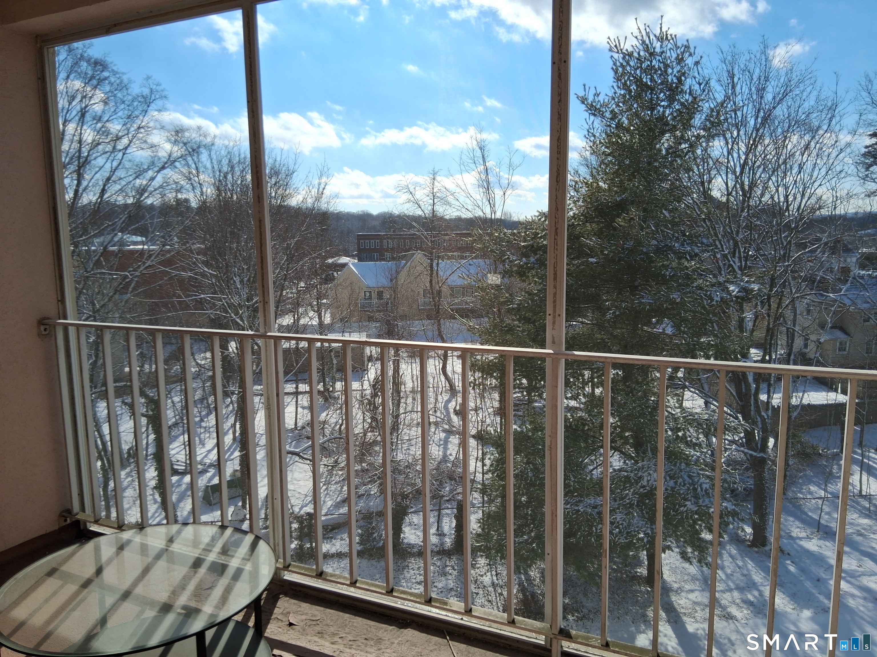 75 Washington Avenue, Unit 2402 Hamden, CT 06518 - Photo 11 of 11 a view of a balcony with chair