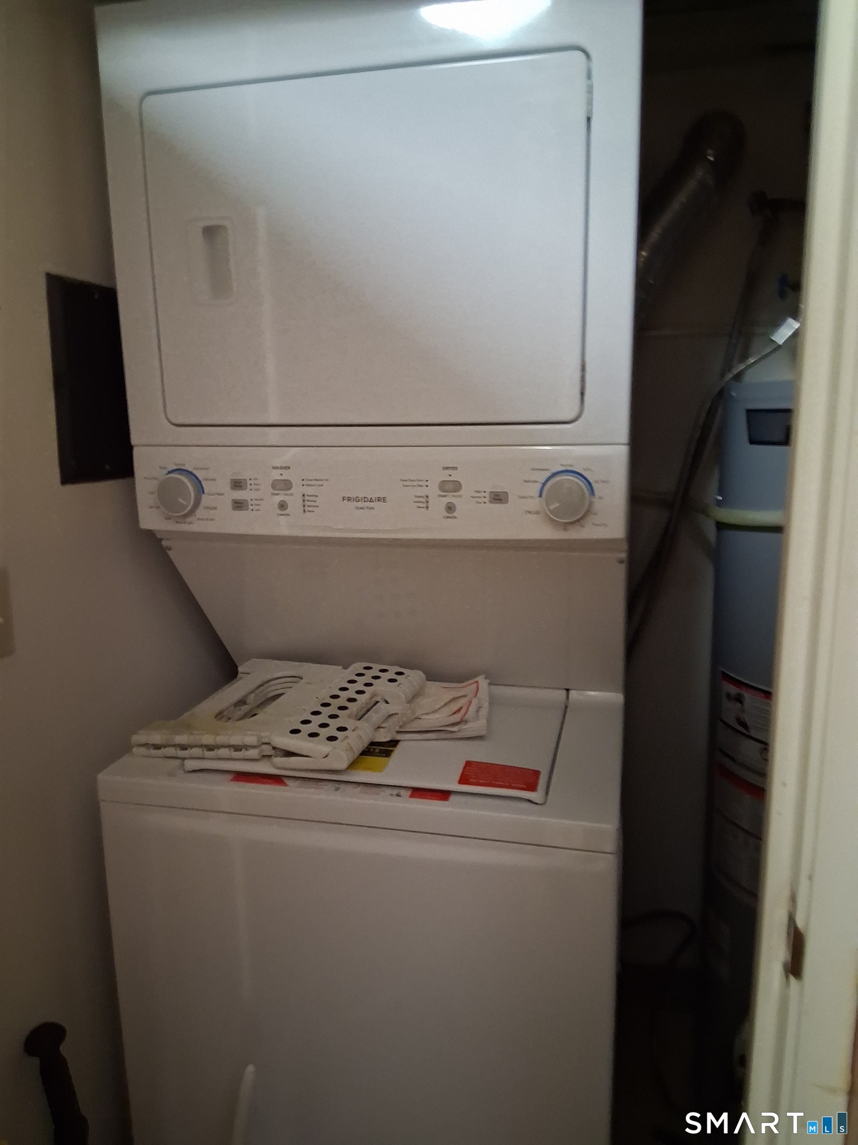 75 Washington Avenue, Unit 2402 Hamden, CT 06518 - Photo 5 of 11 a close up view of washer and dryer