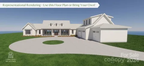 a front view of a house with garage