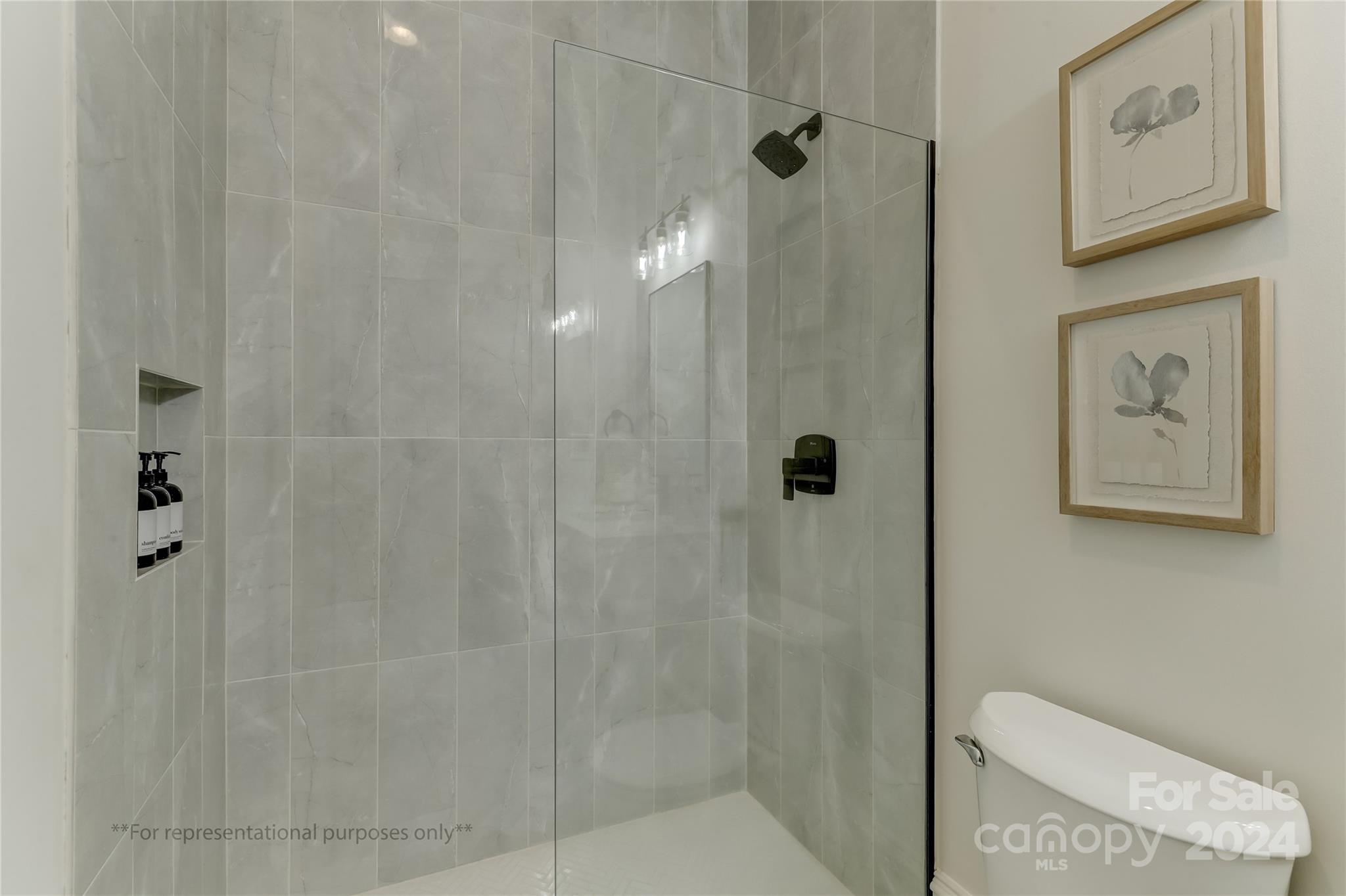 2328 Bridgewater Road, Unit 5 Rock Hill, SC 29730 - Photo 19 of 24 a bathroom with a shower and toilet