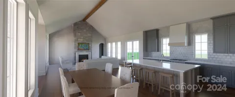 a view of a dining room with furniture and window