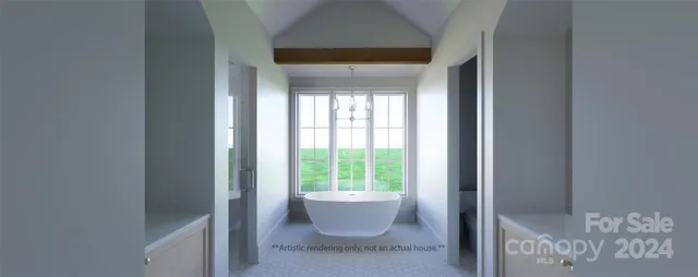 a room with a window and a potted plant