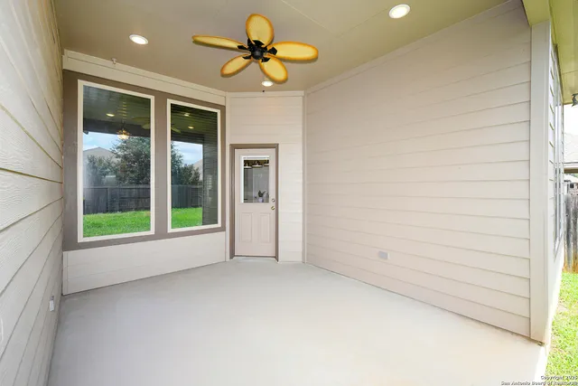 a view of an empty room and window