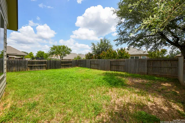 a view of a backyard with a garden
