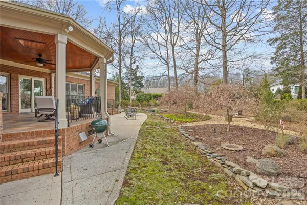 a view of yard with large tree