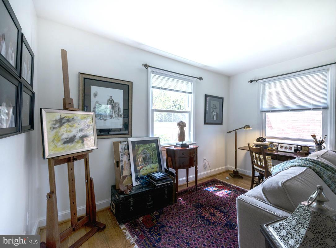 1312 Leegate Road Northwest Washington, DC 20012 - Photo 17 of 30 a living room with furniture fireplace and a window