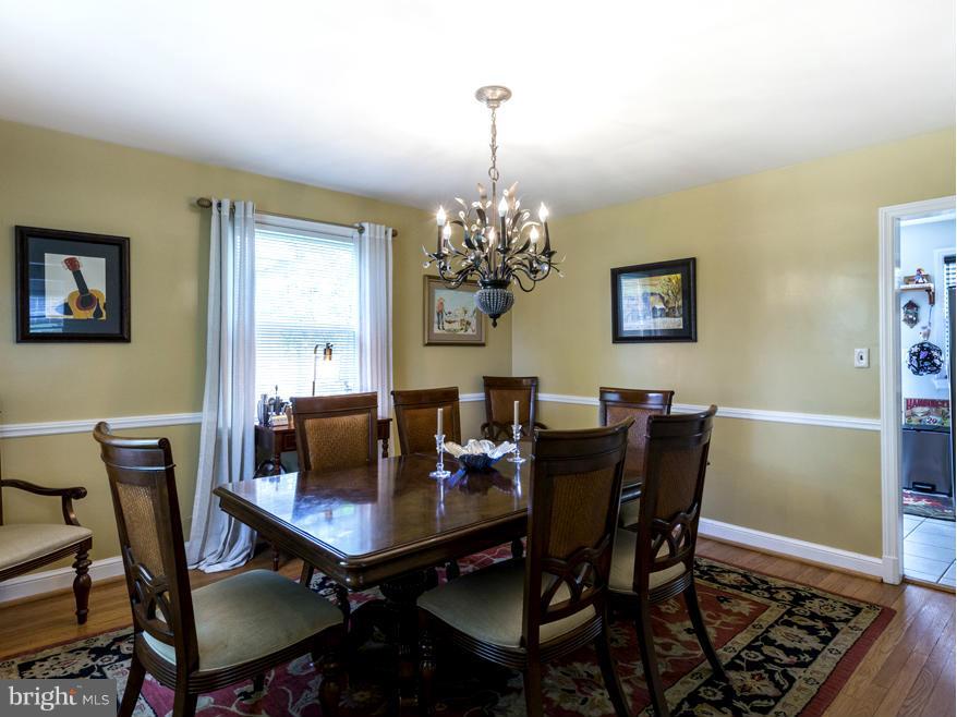 1312 Leegate Road Northwest Washington, DC 20012 - Photo 9 of 30 a dining room with furniture and window
