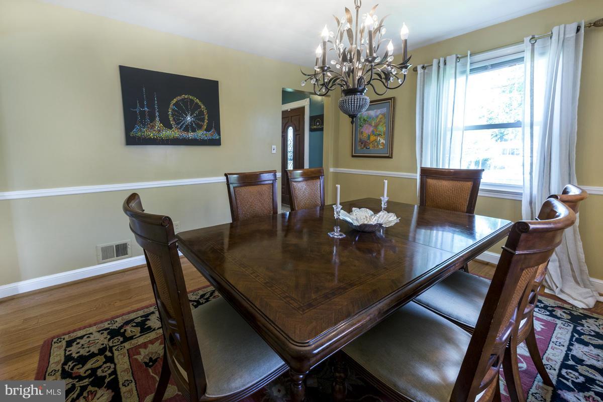 1312 Leegate Road Northwest Washington, DC 20012 - Photo 10 of 30 a view of a dining room with furniture and window