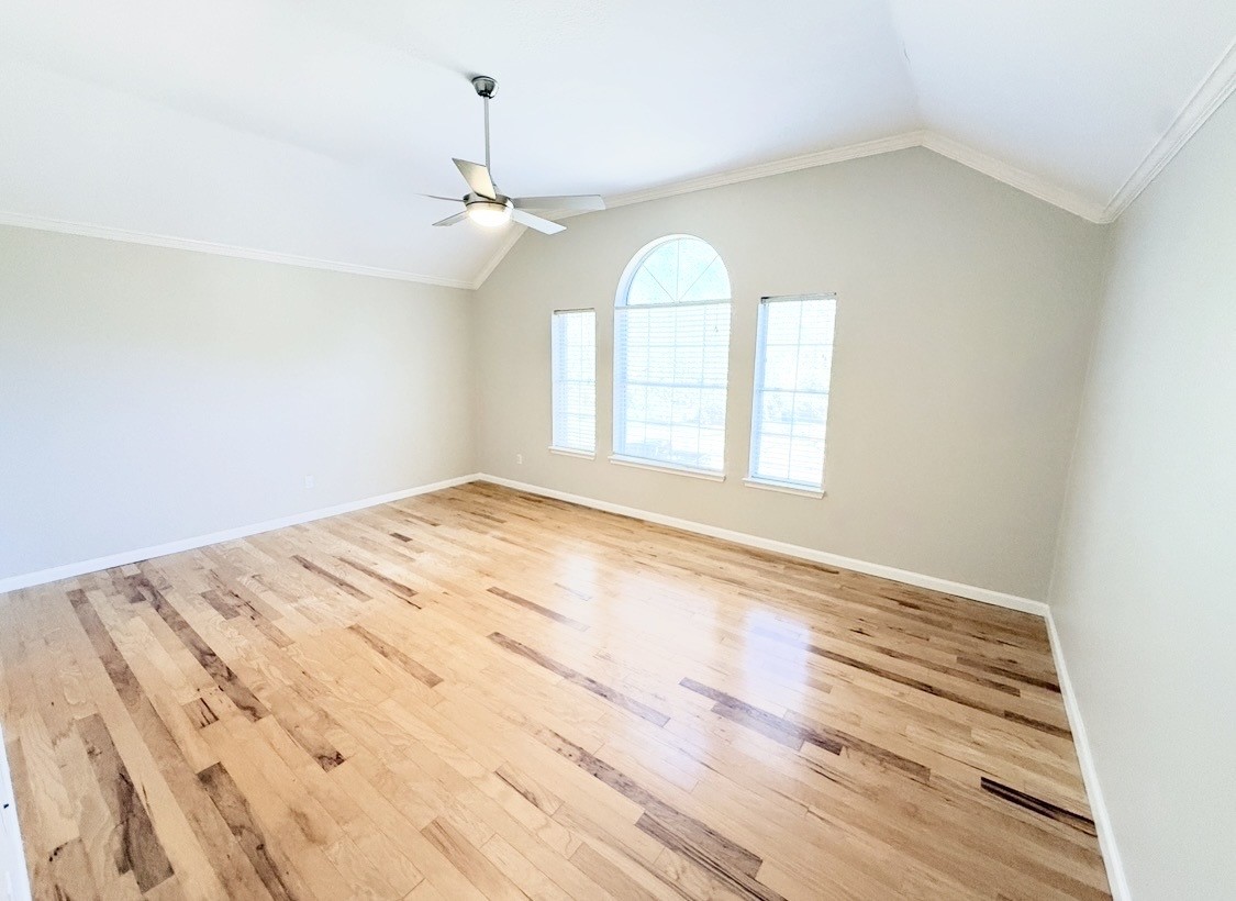 245 North Ranch House Road Angleton, TX 77515 - Photo 13 of 19 This spacious primary bedroom features beautiful natural light and plenty of room to create your own personal retreat.
