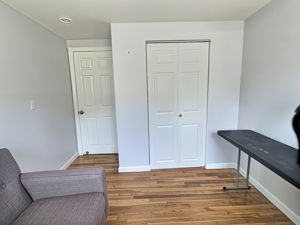 2 McFarlin Road Carver, MA 02330 - Photo 26 of 35 a living room with furniture and a wooden floor