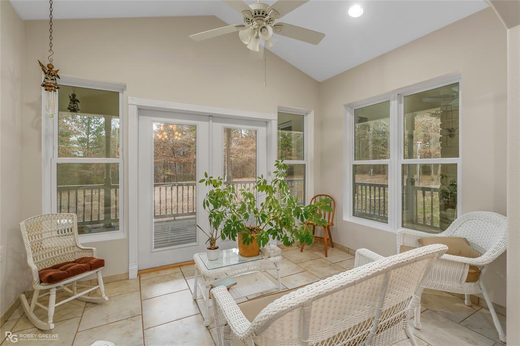 8260 Mira Myrtis Road Rodessa, LA 71069 - Photo 21 of 36 a dining room with furniture and windows