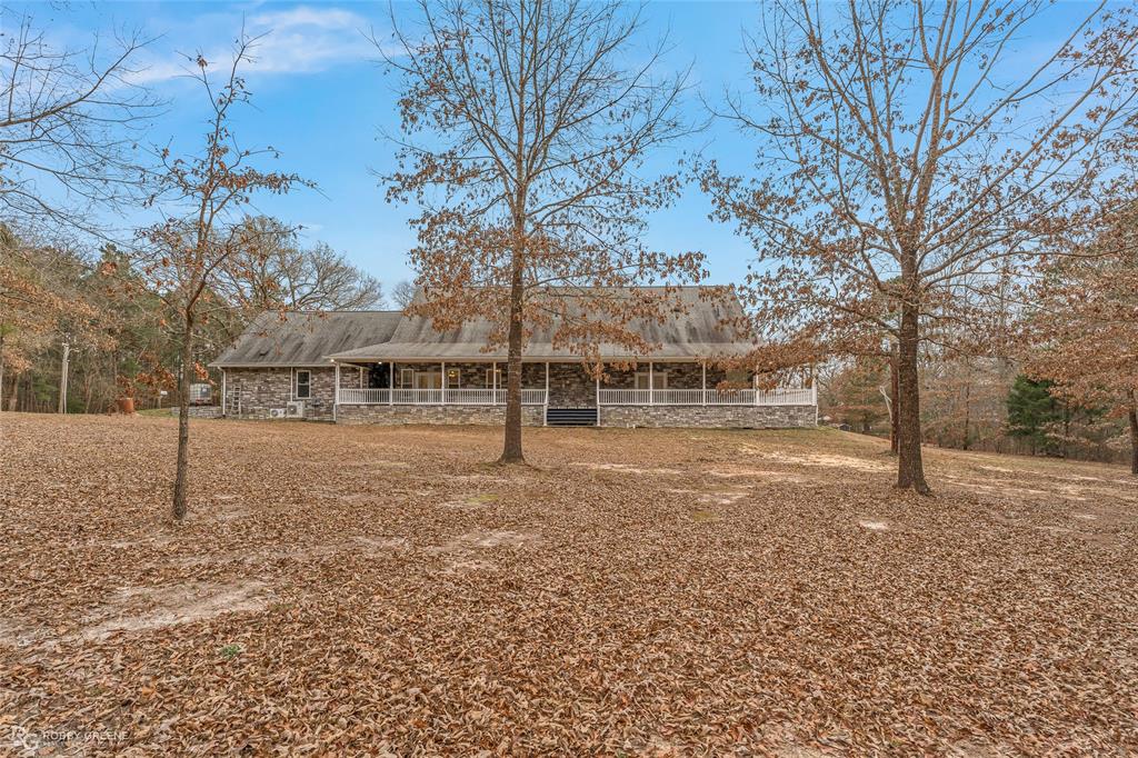 8260 Mira Myrtis Road Rodessa, LA 71069 - Photo 8 of 36 a view of backyard of the house